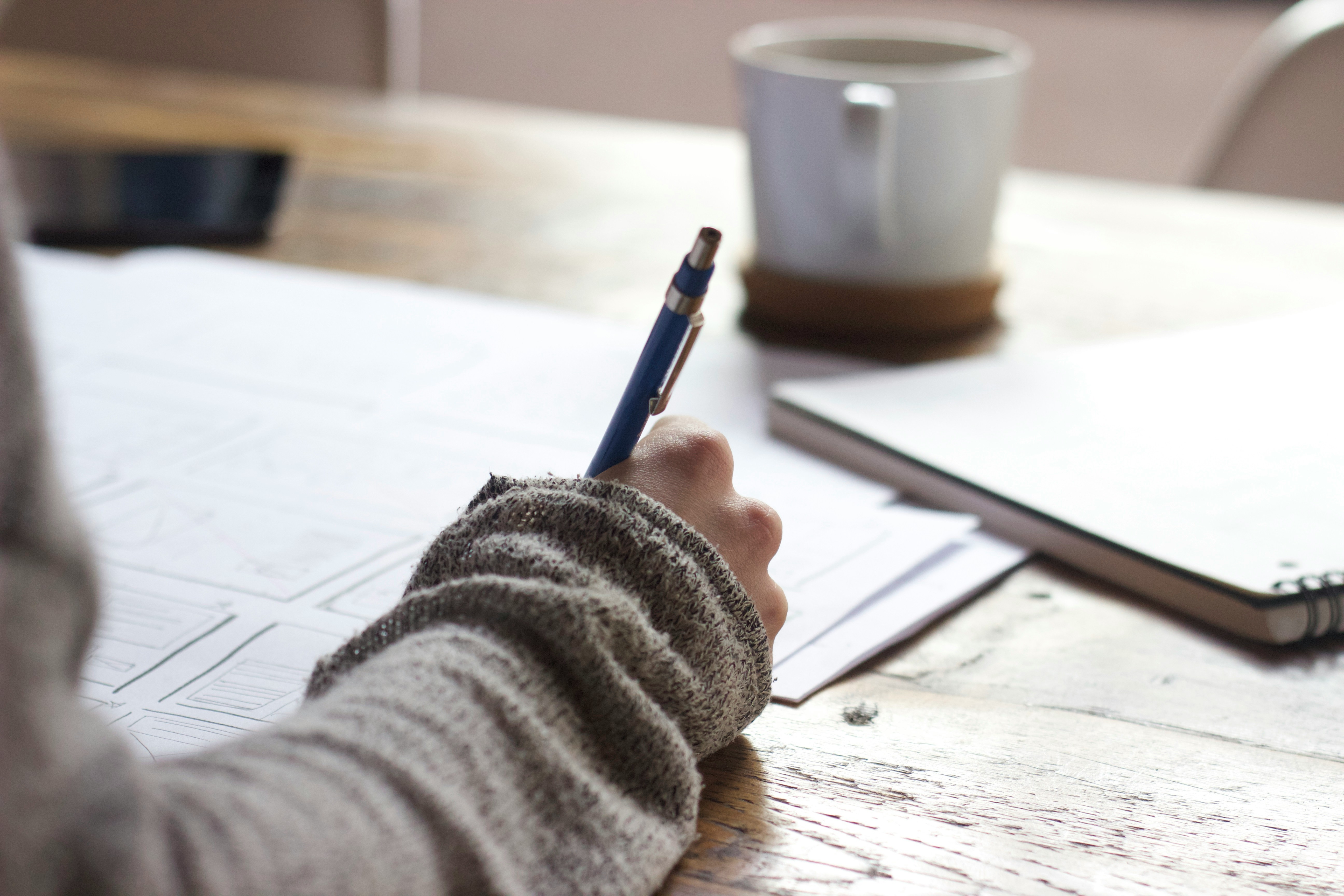 Woman writing and planning